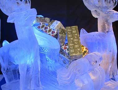 Reindeer and sleigh ice sculpture