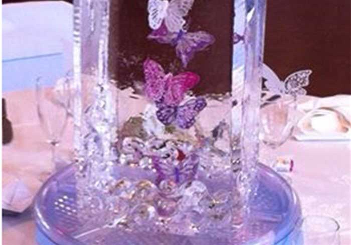 Flowers in an ice sculpture table centre