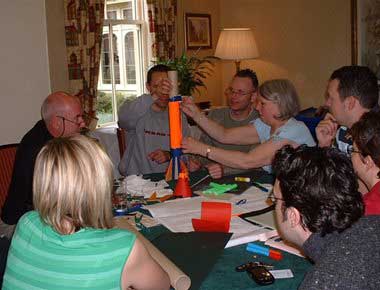 A team deciding on the best rocket design