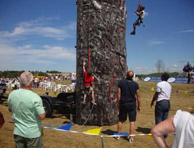 Children Climbing a mobile climbing wall